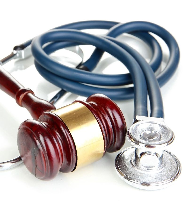 Brown gavel and a medical stethoscope